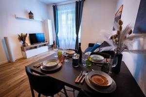 TV a/nebo společenská místnost v ubytování Glam Turin Apartment