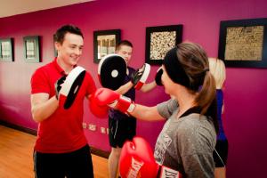 a man and a woman wearing red boxing gloves at Westgrove Hotel in Clane +39 photos