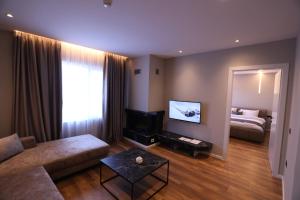 Rúm í herbergi á Dallga Suites