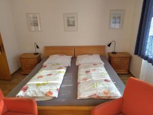 Cama o camas de una habitación en Gästehaus Gruben