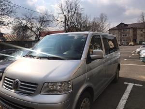 a silver van parked in a parking lot at Mona Apartment Taxi#Airport #PARKING#BUCHAREST#THERME in Otopeni
