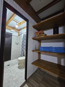 a bathroom with a toilet and a shower at Chalet Los Sinsontes in San Rafael