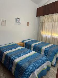Ένα ή περισσότερα κρεβάτια σε δωμάτιο στο Duplex San Bernardo