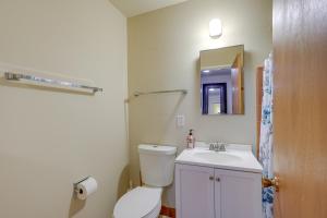 a bathroom with a white toilet and a sink at Downtown Oakland Studio, 6 Mi to Toll Plaza Beach! in Oakland