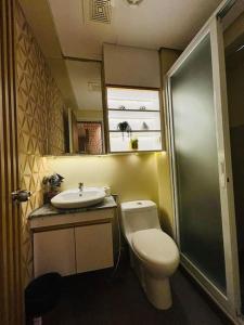 Koupelna v ubytování Cozy Room in Davao by CA Suites