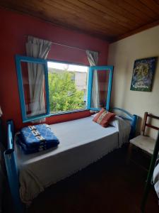 Ліжко або ліжка в номері Onda Verde Hostel