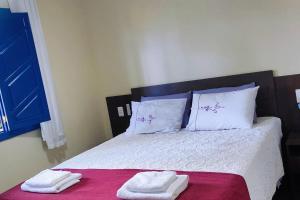Кровать или кровати в номере Recanto Cipó