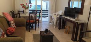 TV a/nebo společenská místnost v ubytování Capão Central