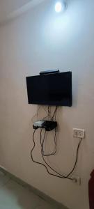TV i/ili multimedijalni sistem u objektu Classic Tourist Home
