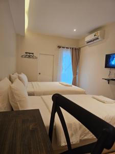 Get GuestHouse 2 ( Sangsri soi 4)客房内的一张或多张床位