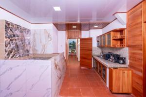 A kitchen or kitchenette at EXCLUSIVE CONDO GALAPAGOS and BEYOND 1