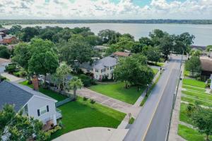 an aerial view of a neighborhood with houses and the water at Beautiful 5BR/4BA Luxury Historic Home on Success in Lakeland
