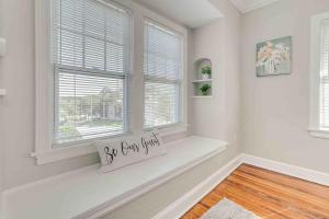 a white room with a window with a window sill at Beautiful 5BR/4BA Luxury Historic Home on Success in Lakeland