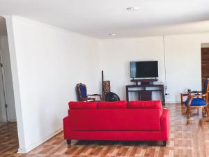 TV a/nebo společenská místnost v ubytování Cabaña con piscina