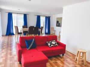 Posezení v ubytování Cabaña con piscina