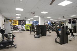 a gym with a lot of treadmills and machines at Casa Marina - Modern, Stylish, Secure & Spacious Condo with 2 Master Suites in MDR & Close to Venice Beach in Los Angeles