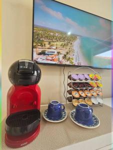 TV a/nebo společenská místnost v ubytování Marques Beach House + 9 fotografií
