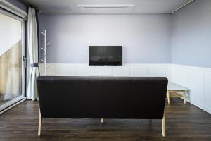 TV a/nebo společenská místnost v ubytování Handongijen Pension