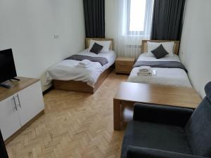 Voodi või voodid majutusasutuse V.MOD Hotel toas