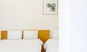Postel nebo postele na pokoji v ubytování Latterace Resort