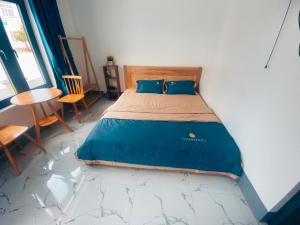 Giường trong phòng chung tại Homestay Duyên Đảo Phú Quý