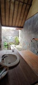 Ett badrum på Sari Papandayan Resort Syariah