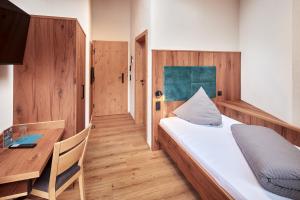 Postel nebo postele na pokoji v ubytování Panoramahotel Burgeck