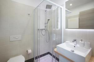 Ванная комната в Casa Vacanza Comelico Dolomiti Appartamento Comfortspace