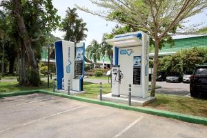 a couple of gas pumps in a parking lot at Le Meridien Phuket Beach Resort - in Karon Beach