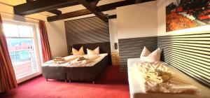 Ένα ή περισσότερα κρεβάτια σε δωμάτιο στο Apart Hotel Wernigerode