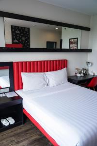 Postelja oz. postelje v sobi nastanitve Kalya Hotel Bandung Dago