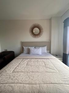 Postelja oz. postelje v sobi nastanitve Kalya Hotel Bandung Dago