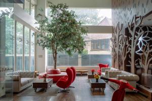 Predel za sedenje v nastanitvi Kalya Hotel Bandung Dago