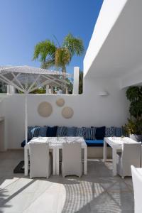 Χώρος καθιστικού στο VOTSALO - Semi Based Studio with Indoor Garden - Part Of White Dunes Luxury Boutique Hotel