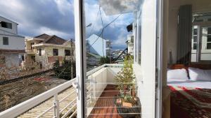 Balkón nebo terasa v ubytování Đông Đức Hostel Đà Lạt