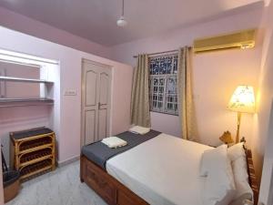 מיטה או מיטות בחדר ב-Kinara 2 bhk Villa