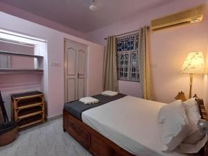 Postel nebo postele na pokoji v ubytování Kinara 2 bhk Villa + 20 fotografií