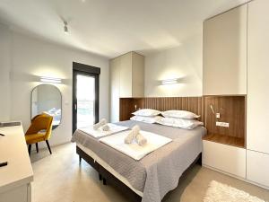 Postel nebo postele na pokoji v ubytování Sandi Hvar Apartments