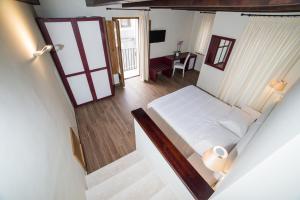 Ліжко або ліжка в номері Il Borgo Ospitale - Albergo Diffuso