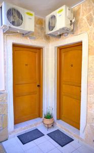 Fotografie z fotogalerie ubytování Houmis Apts & Studios v destinaci Agios Georgios Pagon