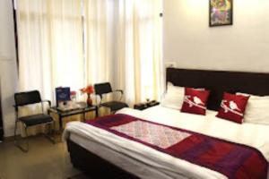 Cama ou camas em um quarto em The Royal Foot Hill Pahalgām