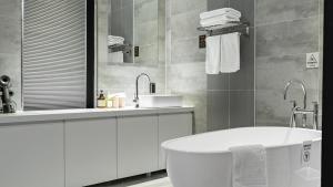 Kopalnica v nastanitvi Hotel Schweizer Dorf Cheonan