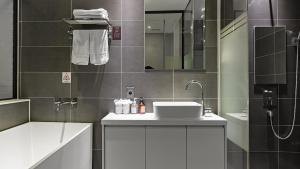 Kopalnica v nastanitvi Hotel Schweizer Dorf Cheonan