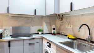 Kuchyňa alebo kuchynka v ubytovaní Love Apartment Málaga Center