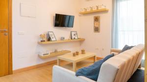 Televízia a/alebo spoločenská miestnosť v ubytovaní Love Apartment Málaga Center
