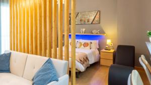 Posteľ alebo postele v izbe v ubytovaní Love Apartment Málaga Center