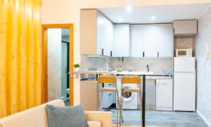 Kuchyň nebo kuchyňský kout v ubytování Love Apartment Málaga Center
