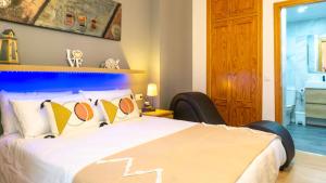 Posteľ alebo postele v izbe v ubytovaní Love Apartment Málaga Center