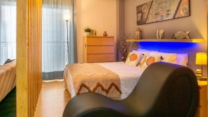 Posteľ alebo postele v izbe v ubytovaní Love Apartment Málaga Center