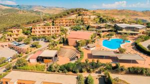 an aerial view of a resort with a swimming pool at Villaggio Porto Rhoca in Squillace